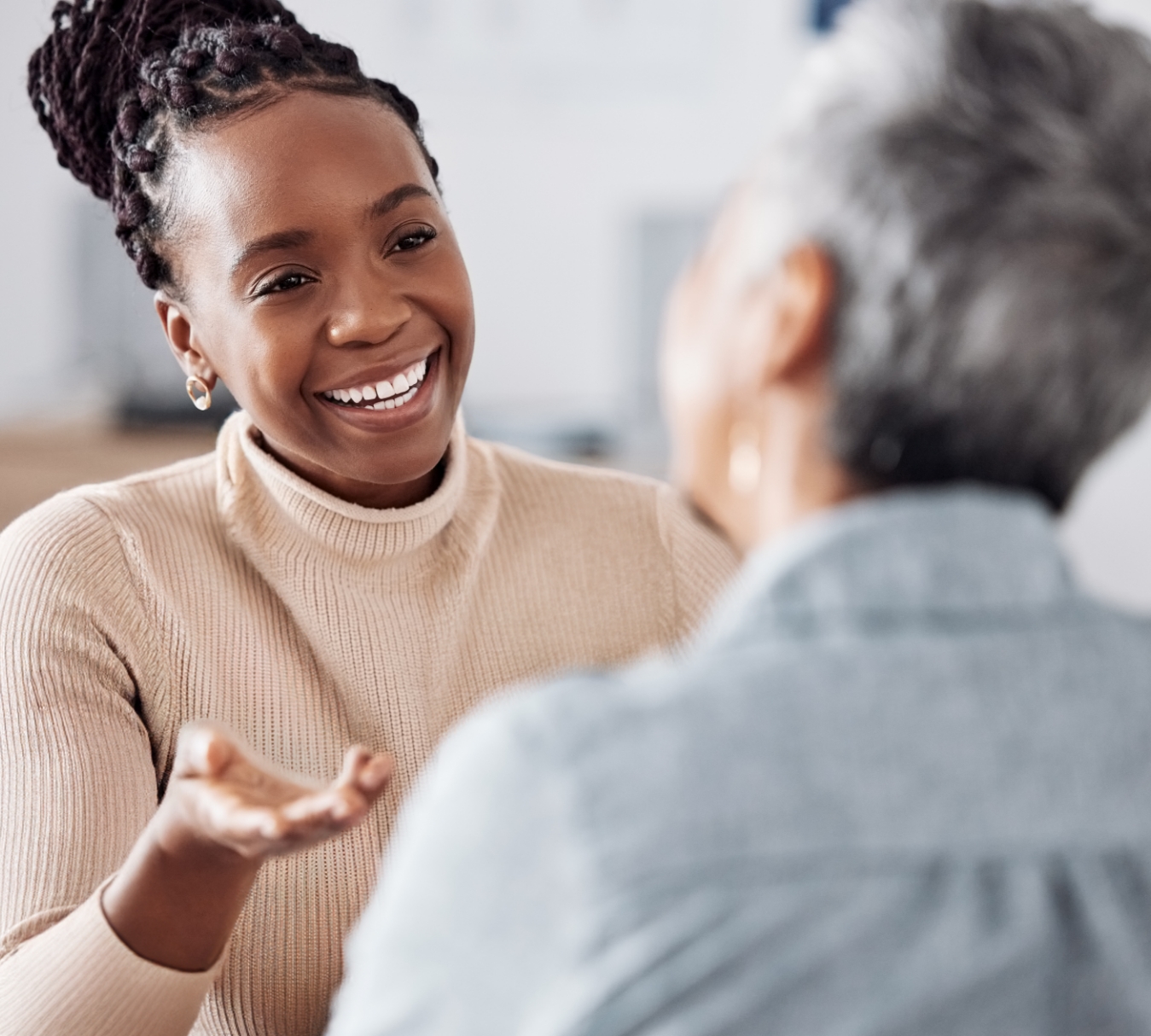 A team member consults a patient's family member.
