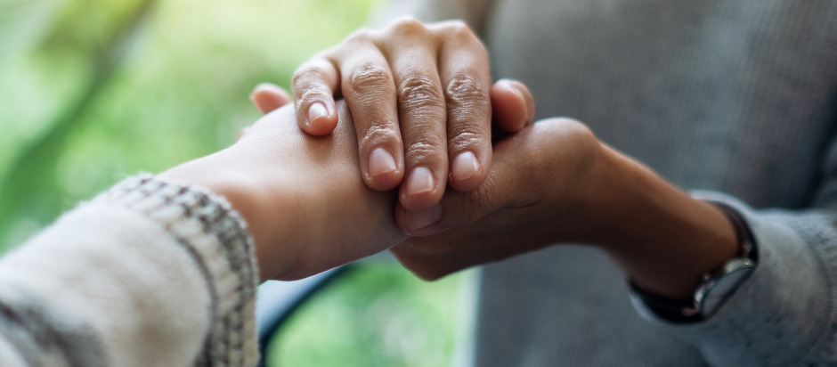 Close-up of holding hands.