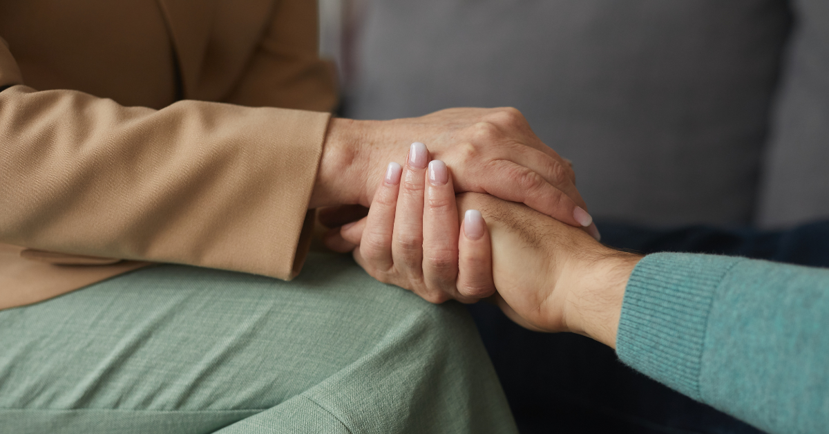 Close-up of holding hands.