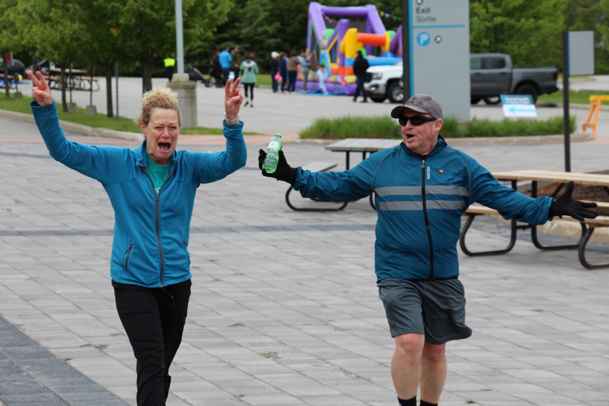 Two runners finishing the run