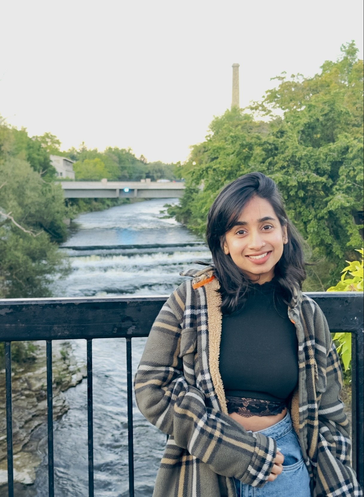 Jasmeen Kaur Kang standing in front of river