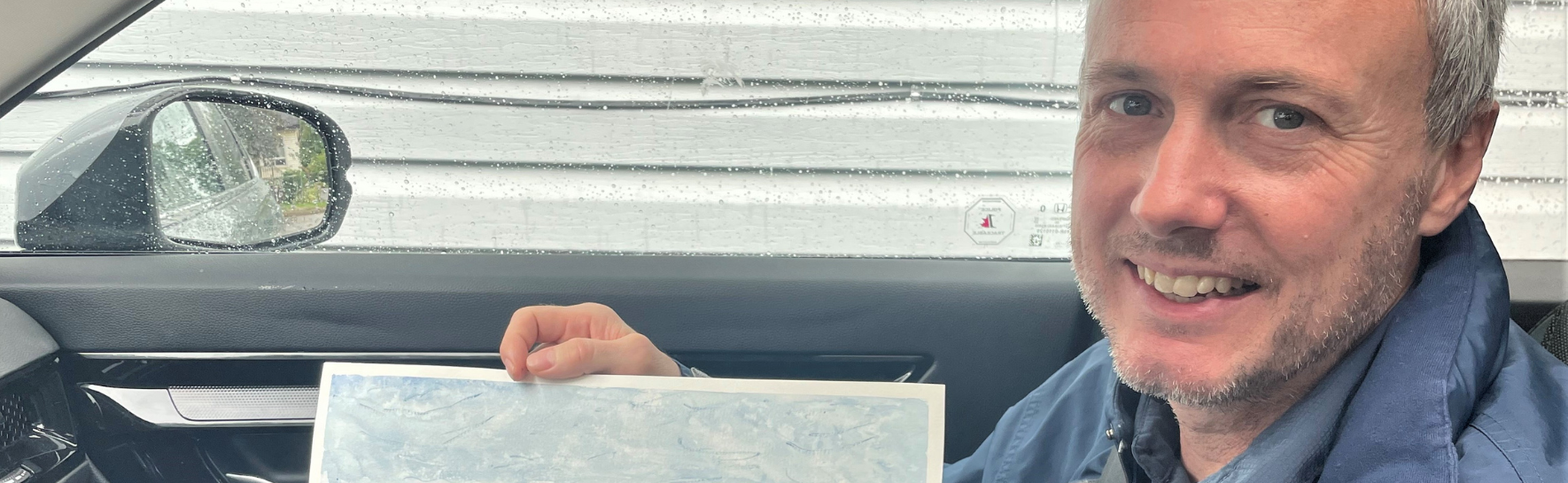 Greg showing his art