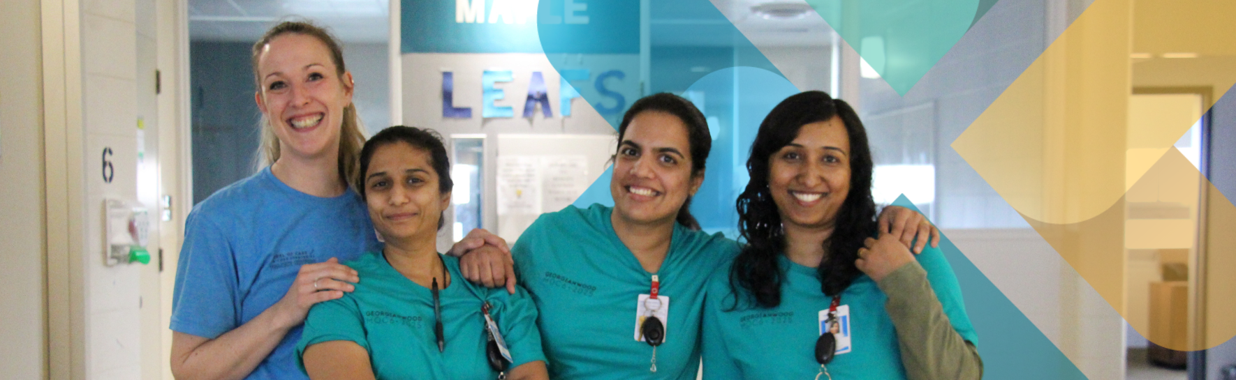 Four nurses smiling