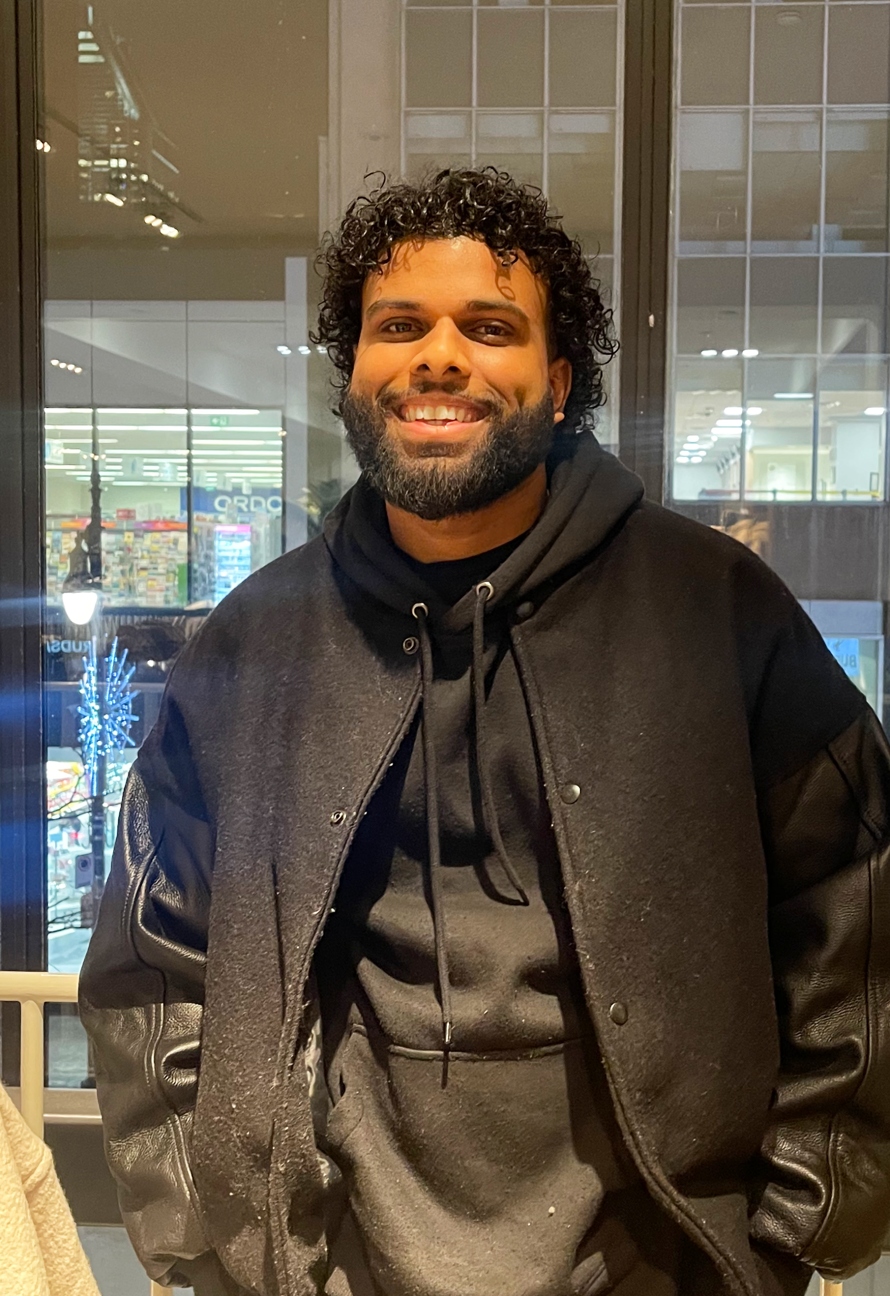 Nafeel Ali standing in front of window.